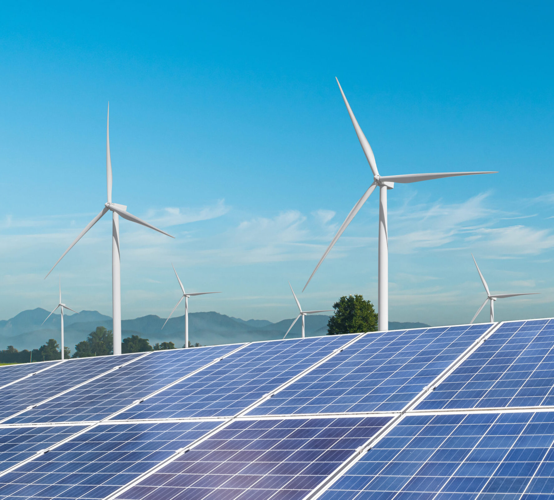 Solar,Panels,With,Wind,Turbines,Generating,Electricity,Over,Blue,Sky